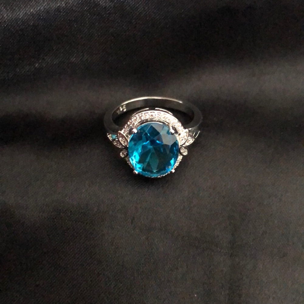 Described on purchase as Sea Blue Topaz Ring